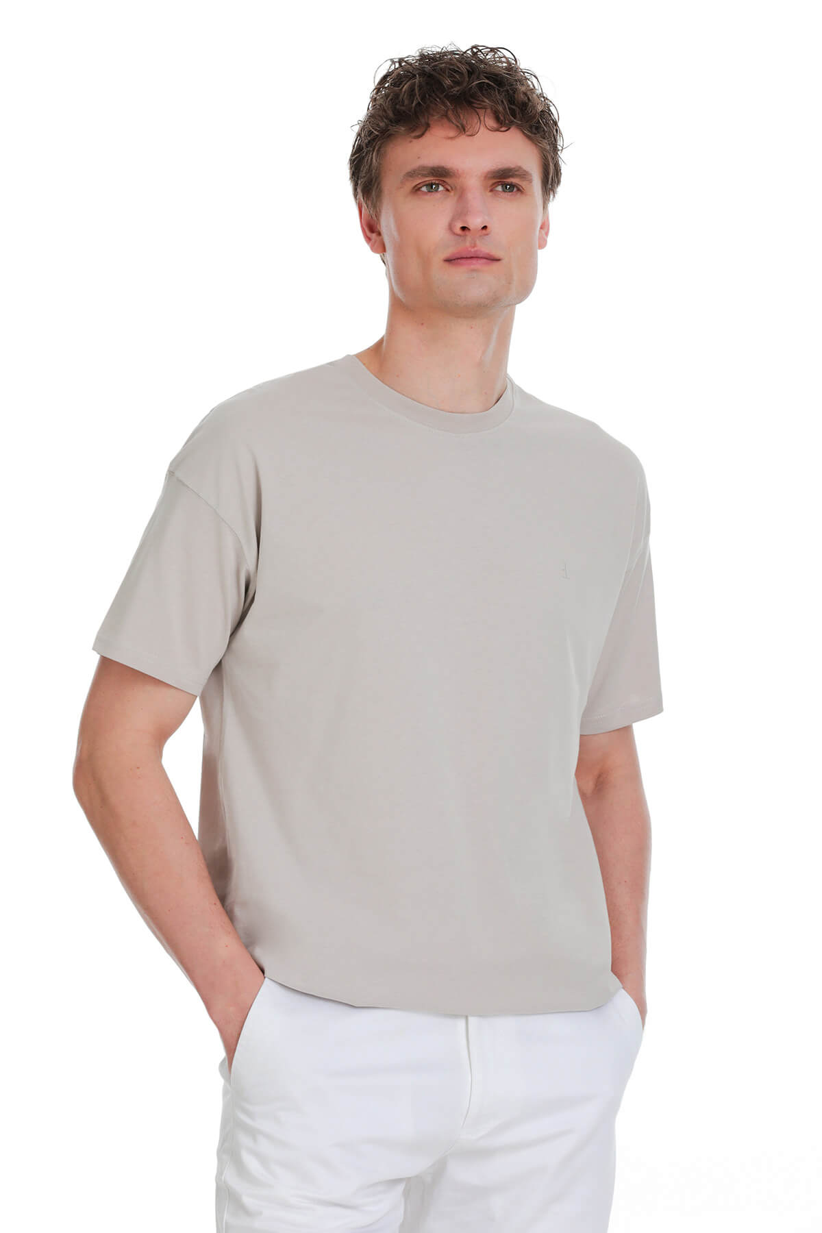 Ecru oversize crew neck t-shirt with short sleeves made of smooth lightweight fabric in a minimalist design
