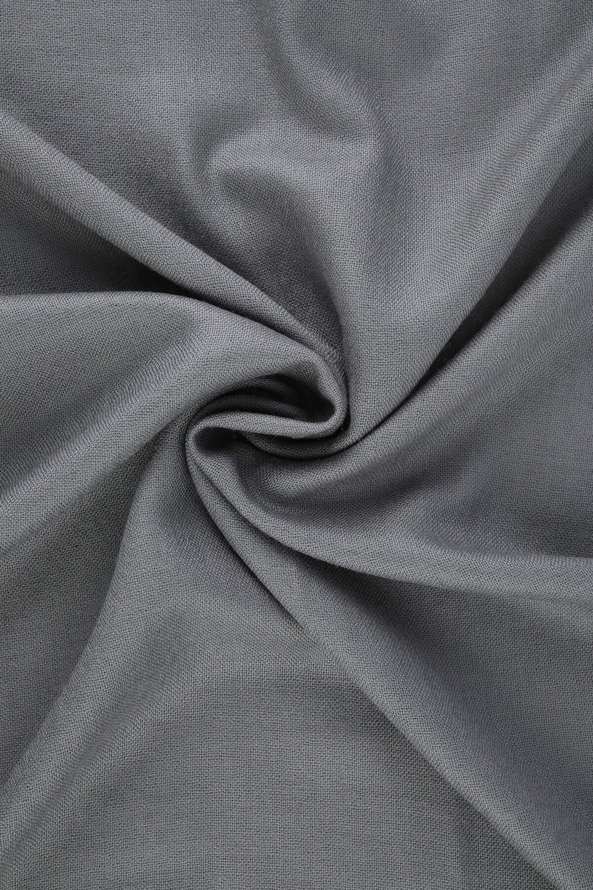 A soft, dark gray woven fabric with a subtle texture and gentle folds.