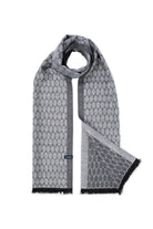 Gray patterned scarf with a repeating oval design and black fringe edges.