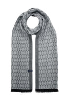 Gray scarf with a repeating geometric pattern and black fringe edges.