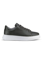 Black pebbled leather low-top sneaker with a white rubber sole and matching laces.