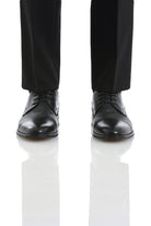 Black leather dress shoes with a polished finish and cap-toe design.