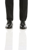 Black patent leather dress shoes with a glossy finish and classic lace-up design.