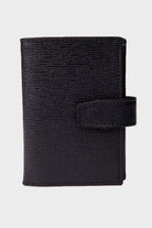 Black textured leather wallet with a flap closure.