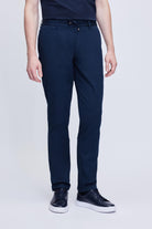 Navy blue tailored trousers with a drawstring waistband