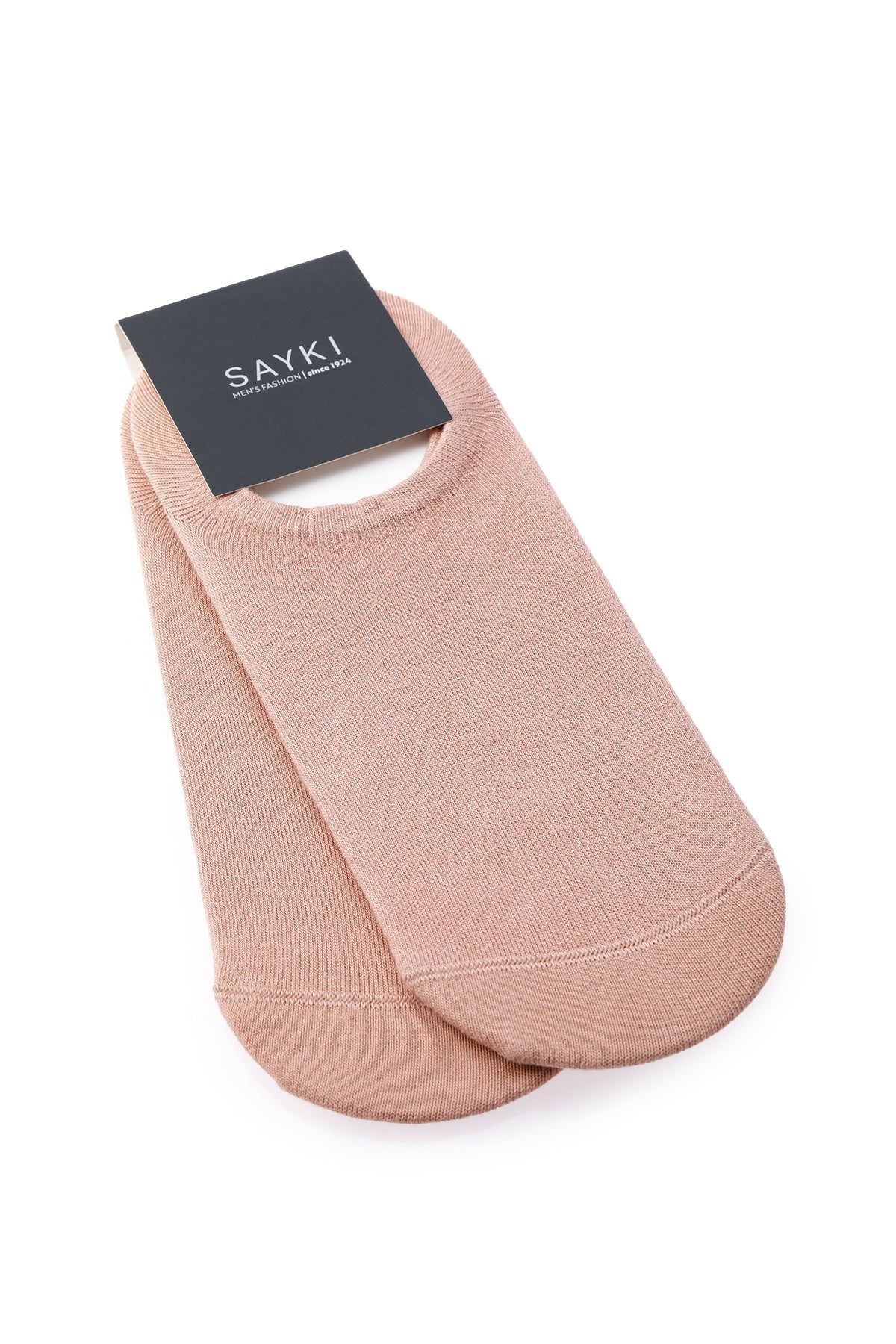 A pair of soft, blush pink ankle socks with a smooth knit texture and a minimalist design.
