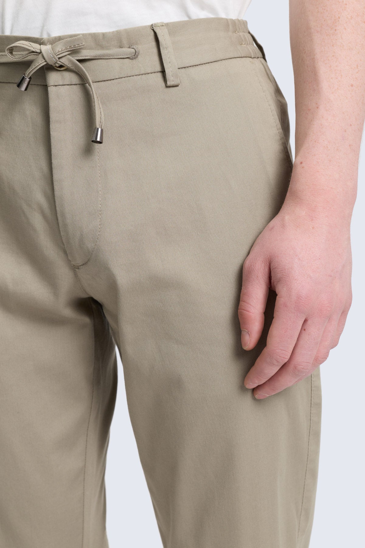 Olive dynamic fit jogger pants in khaki cotton with drawstring waistband and metallic aglets for comfortable wear