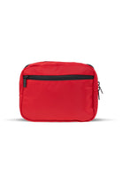 Red rectangular toiletry bag with black zippers and a sleek, minimalist design.