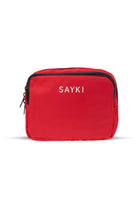 Red sayki brand toiletry bag with black zipper trim.