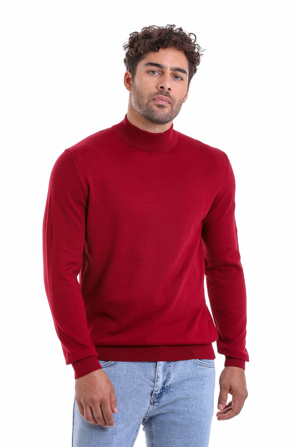 A rich red, long-sleeved turtleneck sweater with a ribbed neckline and cuffs.