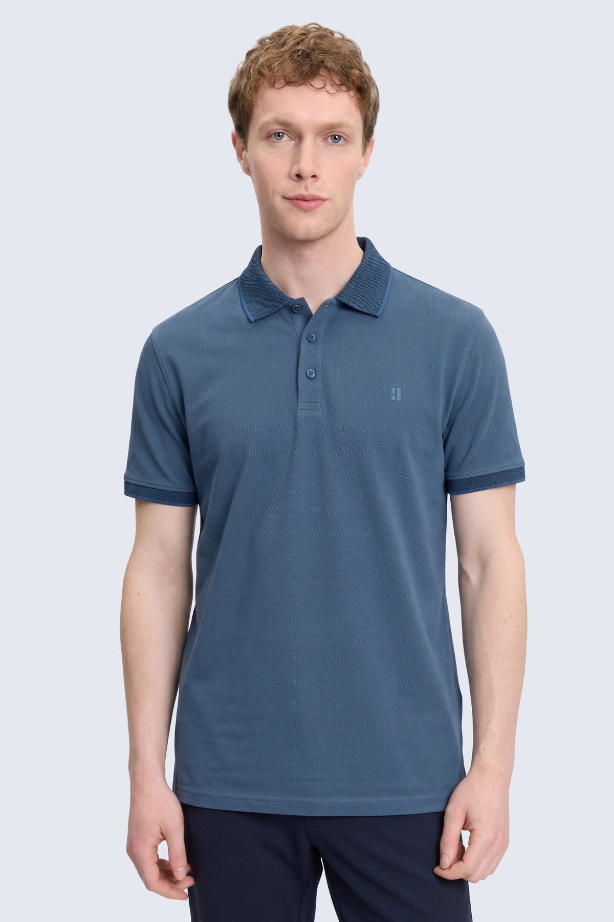 Regular fit cotton indigo polo t-shirt with short sleeves textured fabric and matching collar and sleeve trim