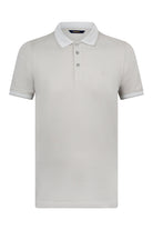 A crisp white short-sleeved polo shirt with a classic collar and subtle embroidered logo on the chest.