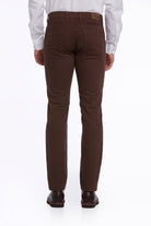 Brown chino pants with a classic fit and subtle stitching details.