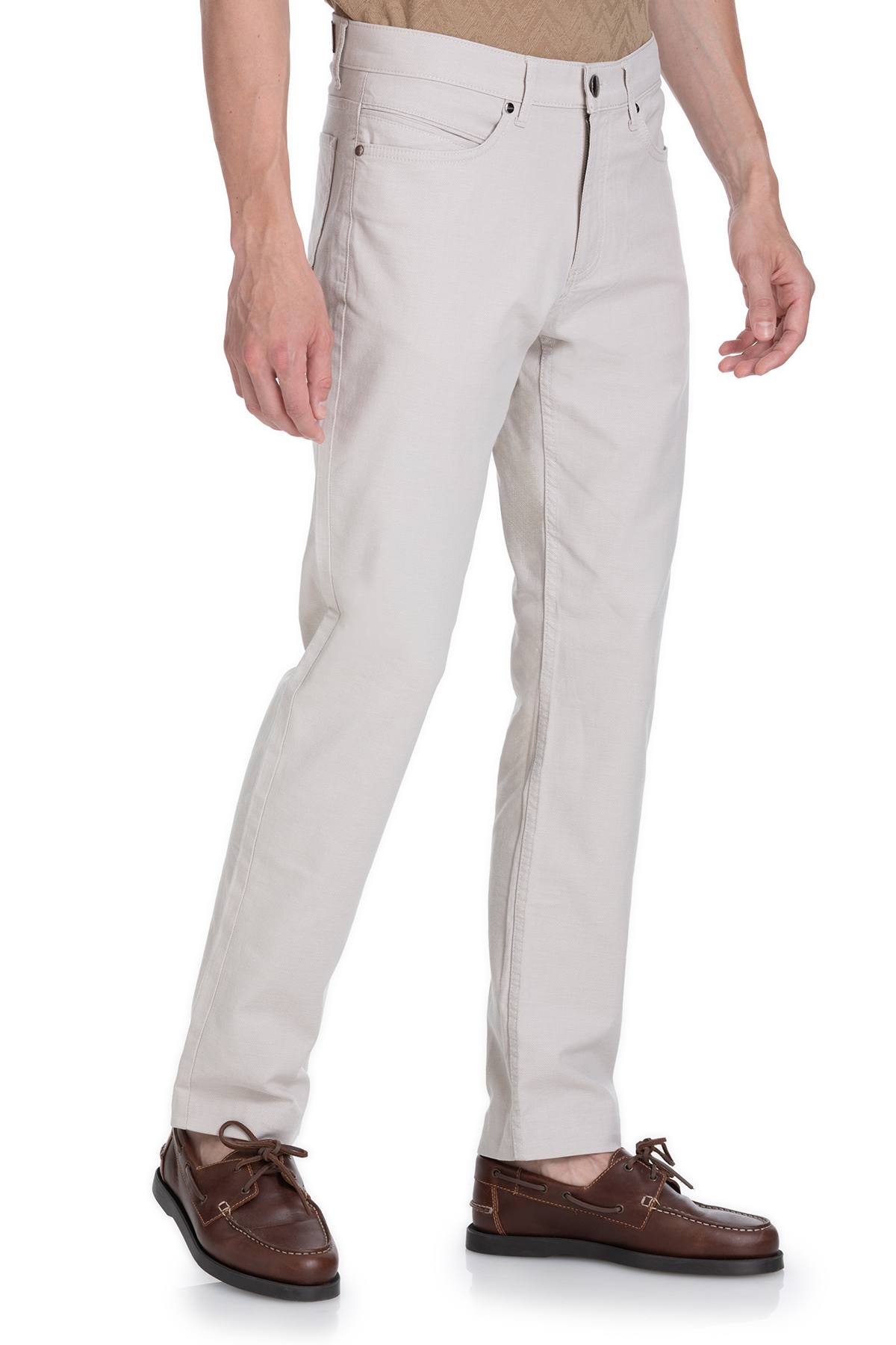 Beige chino trousers with a classic five-pocket design and subtle stitching details.