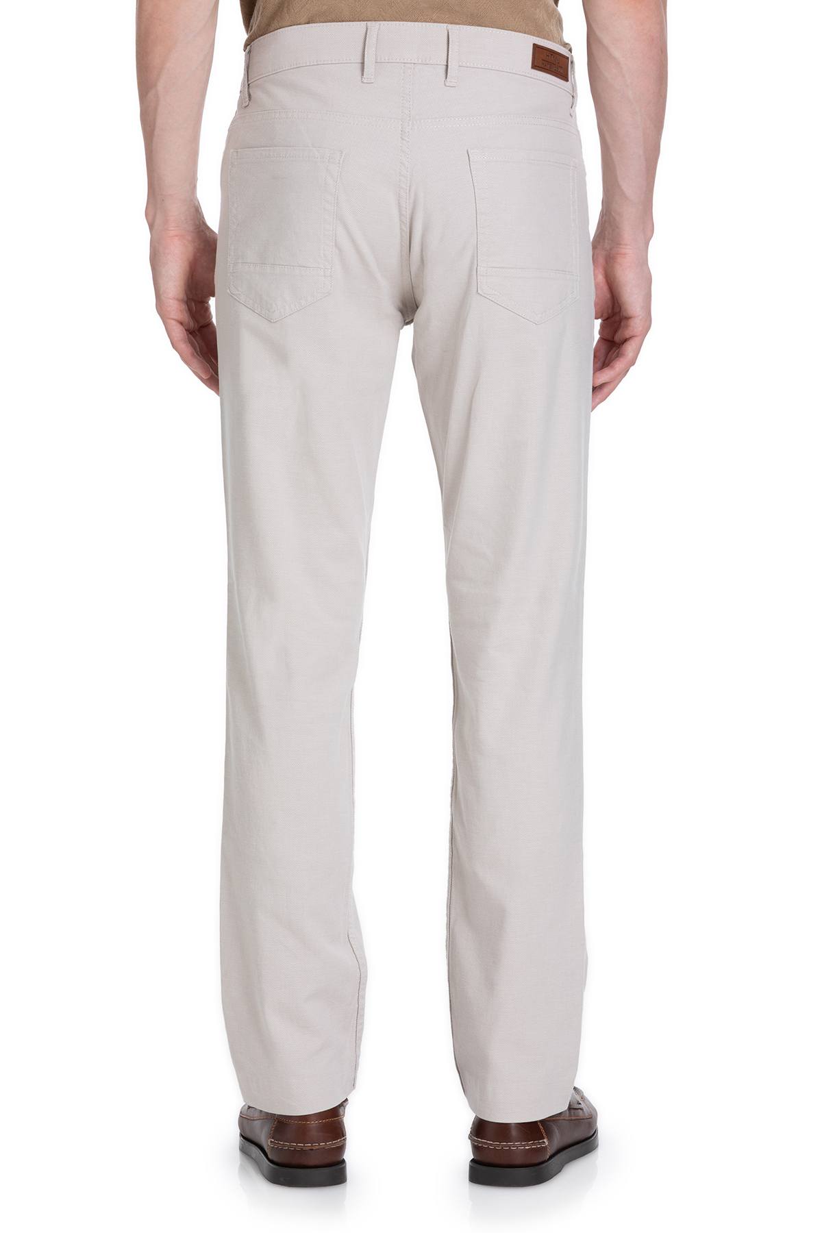 Beige chino pants with a straight-leg cut and brown leather brand patch at the waistband.
