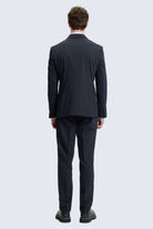 Regular fit black peak lapel double-breasted suit with sleek modern cut and subtle texture tailored for classic style