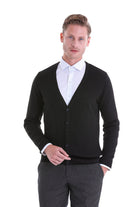 Black ribbed knit cardigan with button closure and white-cuffed sleeves.