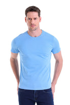 Light blue short-sleeved crew neck t-shirt.