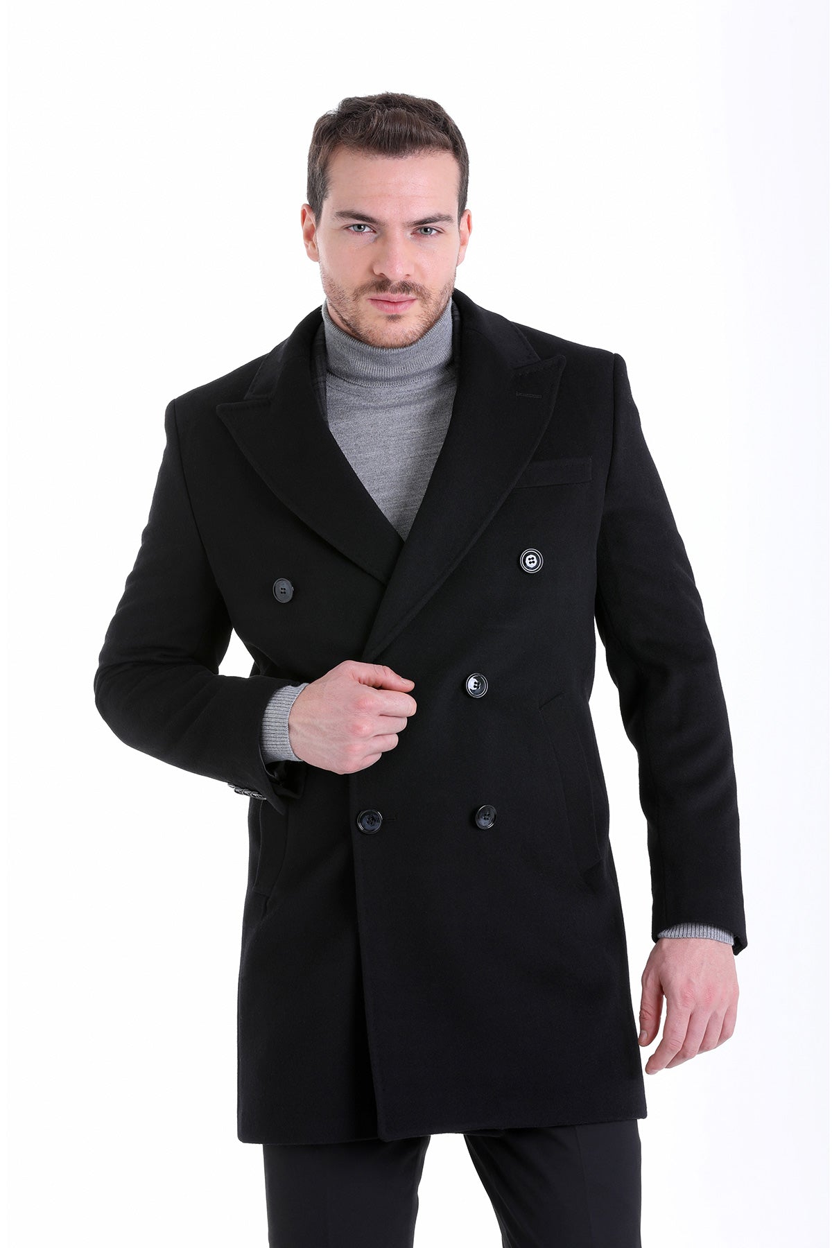 Black double-breasted wool overcoat with silver-toned buttons.