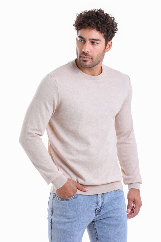 Beige crewneck sweater with ribbed cuffs and hem.