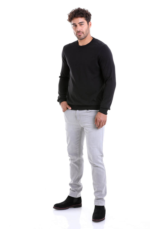 Black long-sleeved crewneck sweater with a smooth, fitted silhouette.