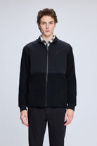 Black zip-up hoodie with a two-tone design, featuring a darker navy upper section and a solid black lower half.