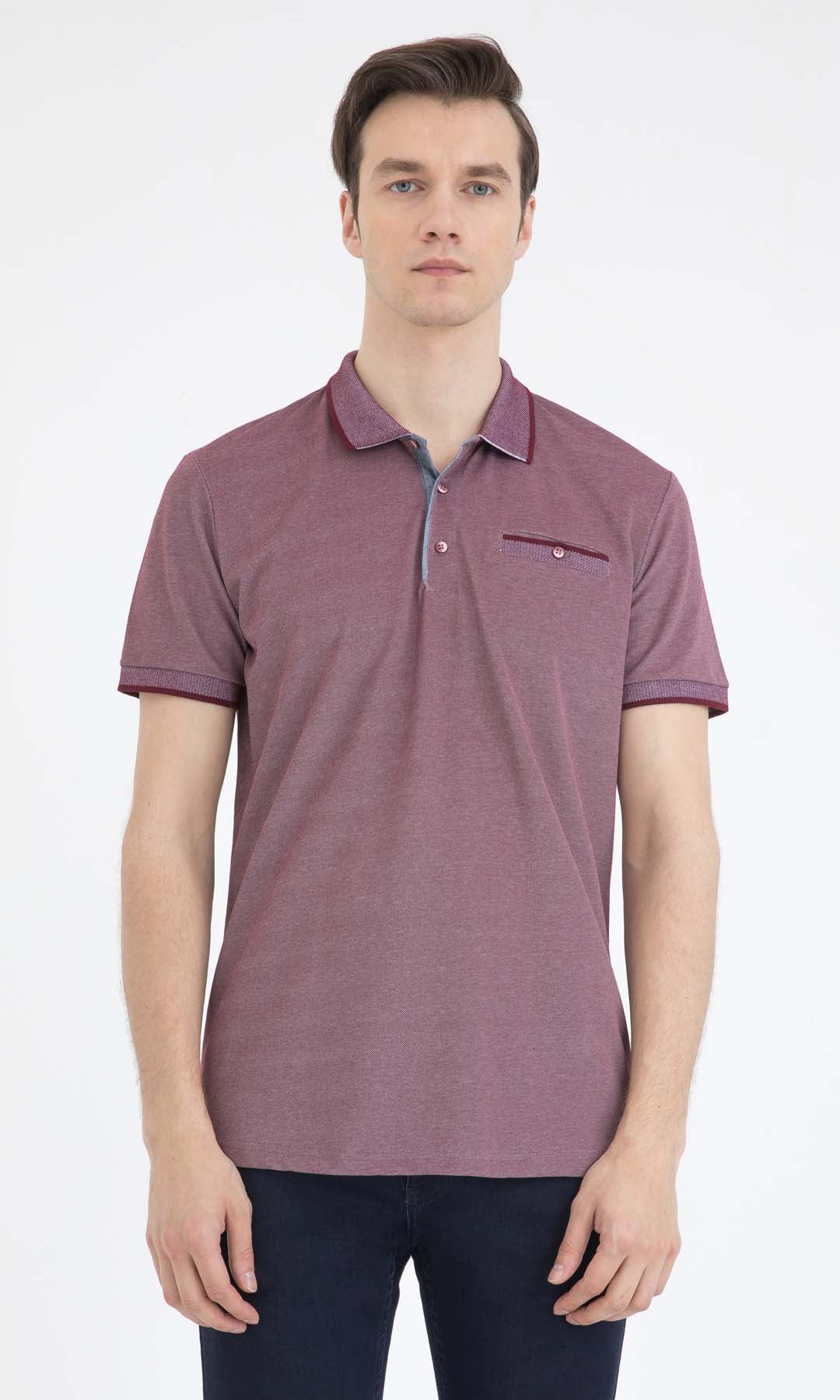 A men’s maroon polo shirt with a subtle textured fabric, featuring a collar and chest pocket accented by matching buttons.