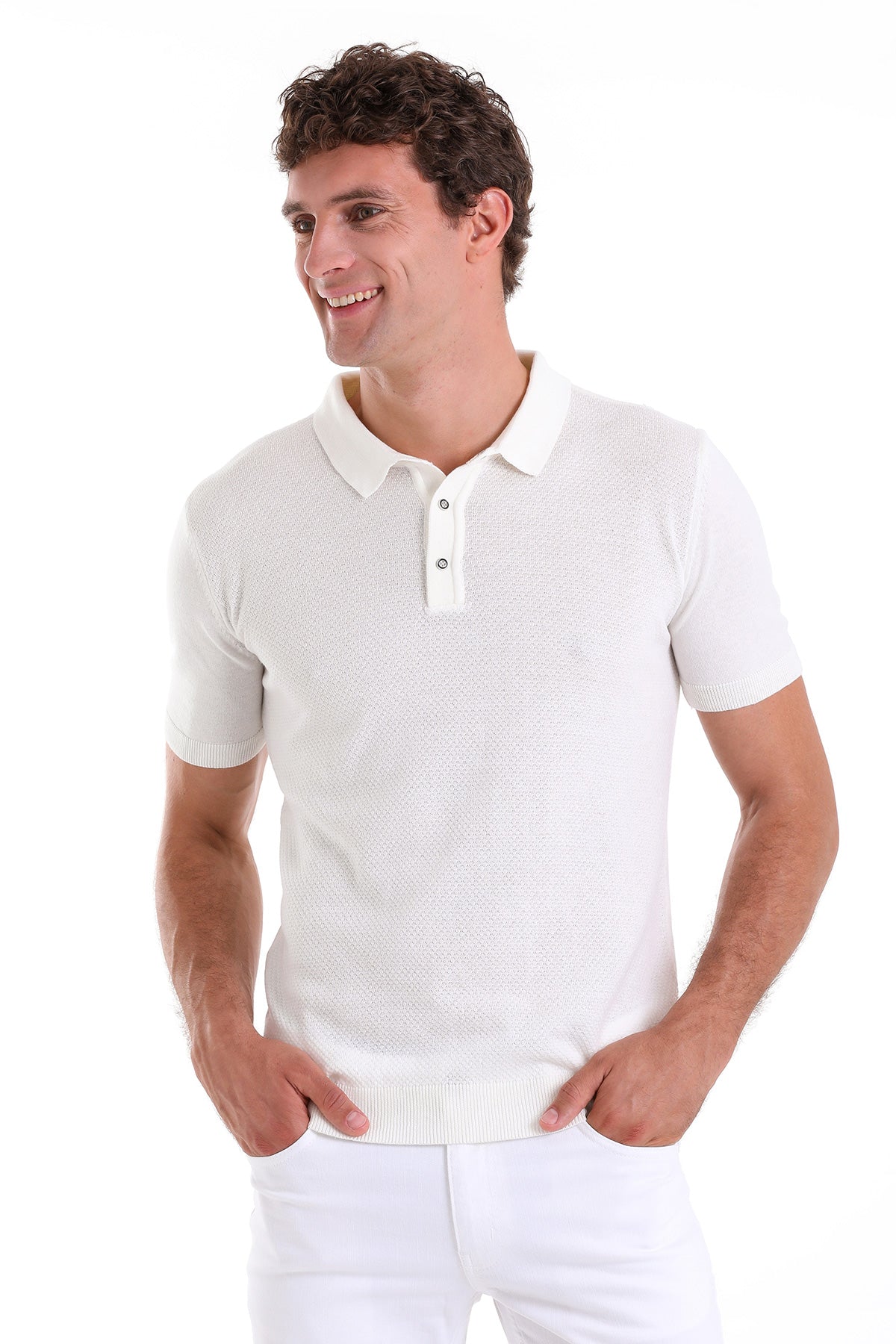 White textured knit polo shirt with a classic collar and button placket.