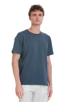 A dark teal, short-sleeved crew neck t-shirt with a subtle embroidered logo on the left chest.