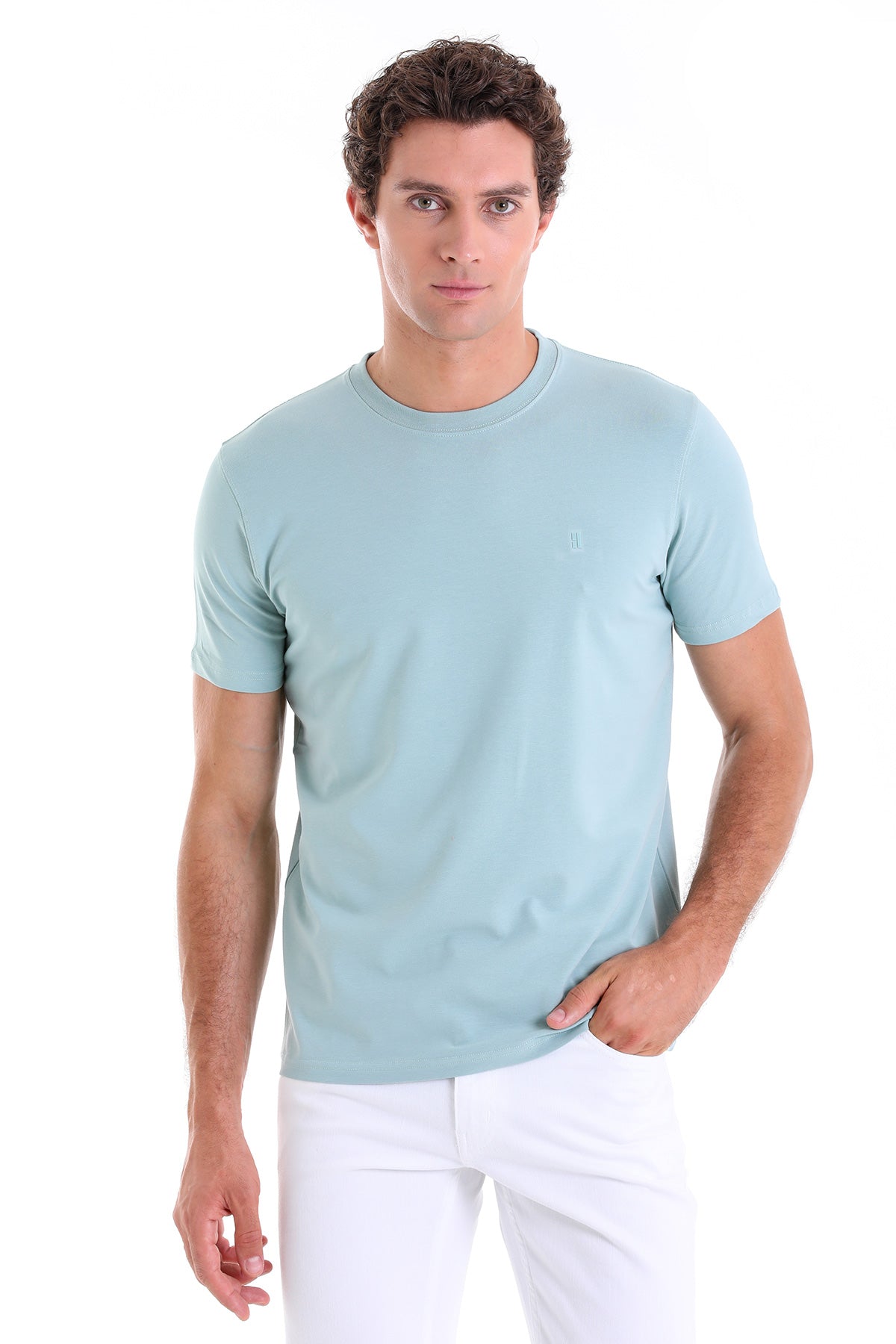 A light blue, short-sleeved crew neck t-shirt with a subtle embroidered logo on the left chest.