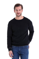 Black crewneck sweater with subtle textured knit and contrasting white trim along the cuffs and hem.