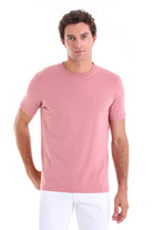 A soft pink, short-sleeved crew neck t-shirt with a subtle embroidered logo on the left chest.