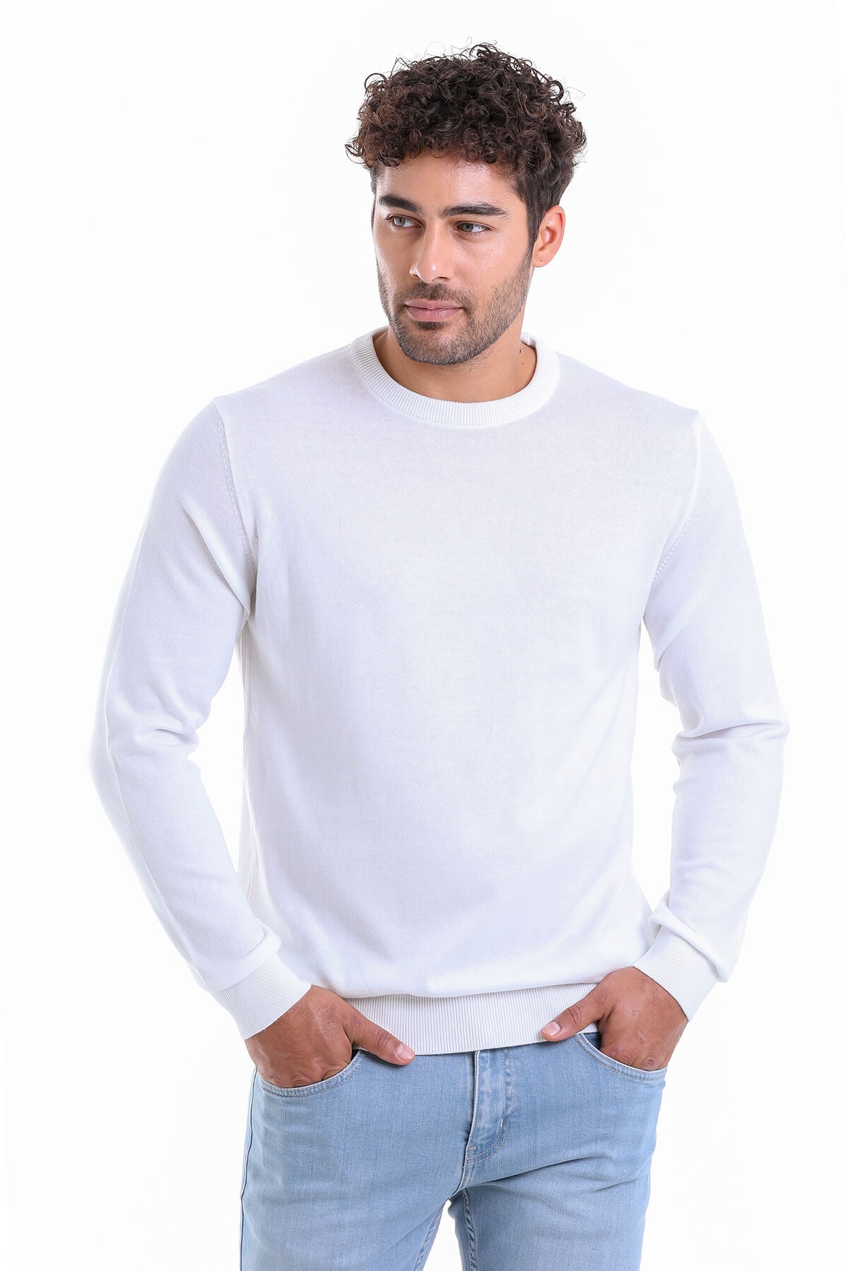 White crewneck sweater with ribbed cuffs and hem.
