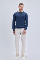 Regular fit cotton crewneck sweater in navy blue with subtle textured knit and ribbed cuffs for comfortable wear