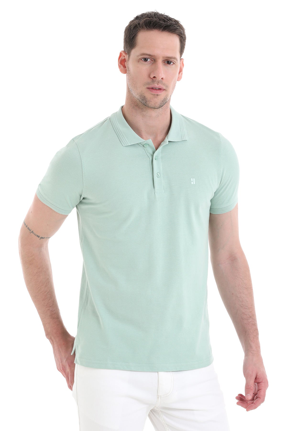 Light green short-sleeved polo shirt with a subtle embroidered logo on the chest.