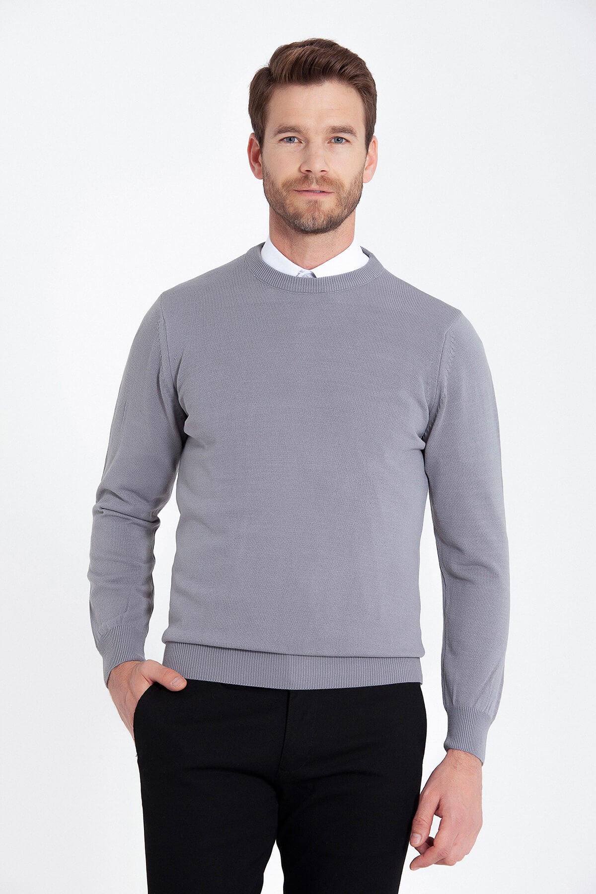 Gray crewneck sweater with ribbed cuffs and hem.