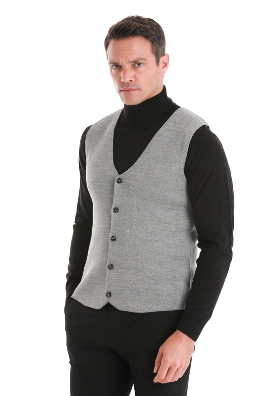 Gray knit vest with black buttons and a v-neckline.