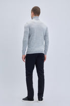A man wearing a regular fit gray turtleneck sweater with ribbed cuffs and hem in light gray color