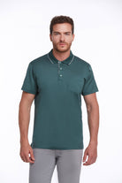 Dark teal short-sleeved polo shirt with white trim on the collar and placket.