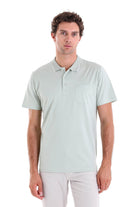 Light green short-sleeved polo shirt with a subtle white trim on the collar and placket.
