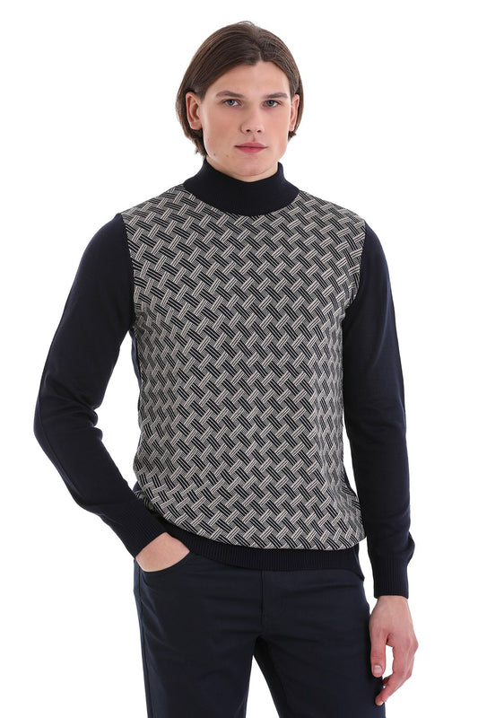 Black and gray geometric-patterned knit vest worn over a black turtleneck.