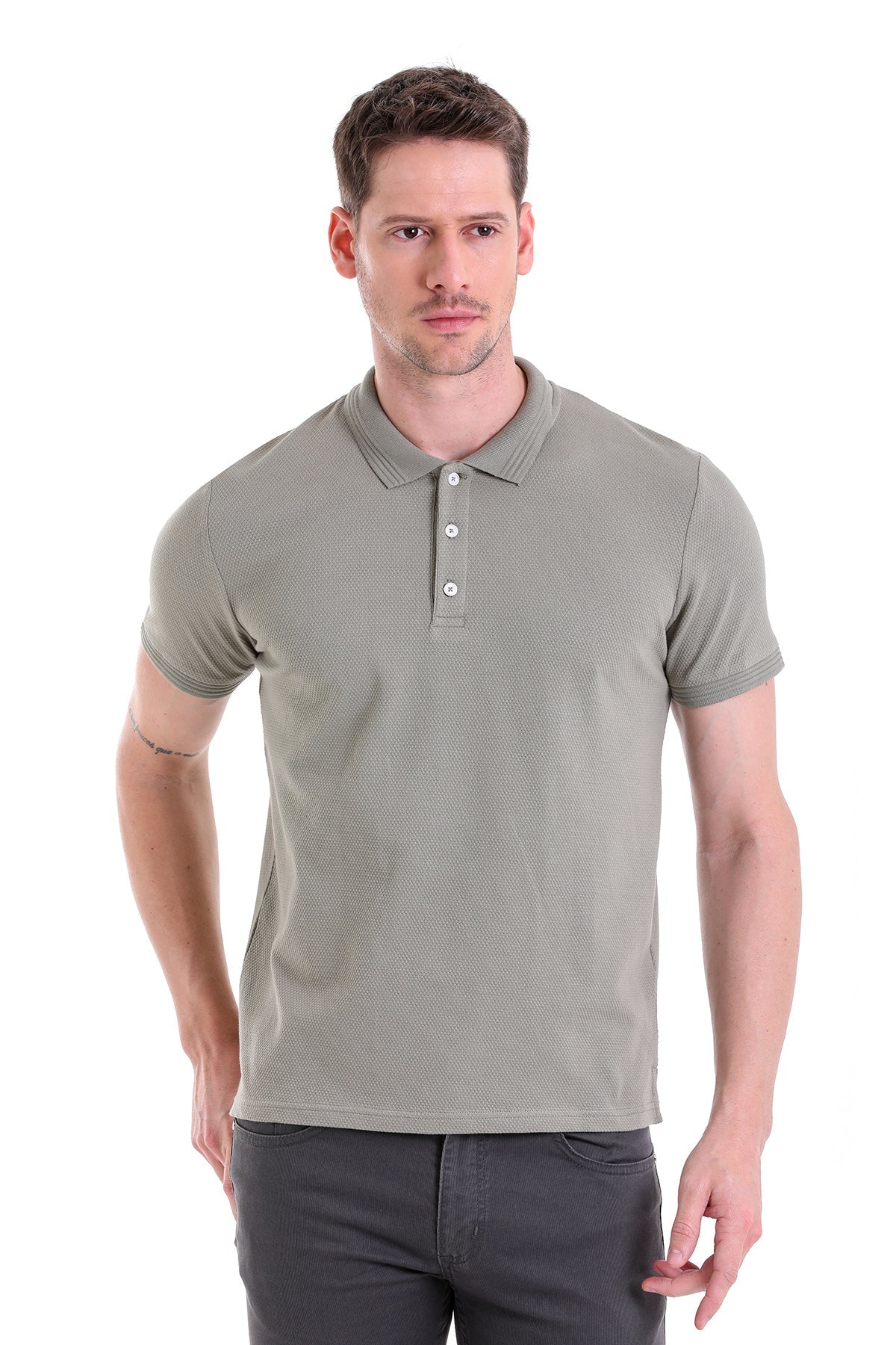 A men’s olive green textured polo shirt with a classic collar and buttoned placket.