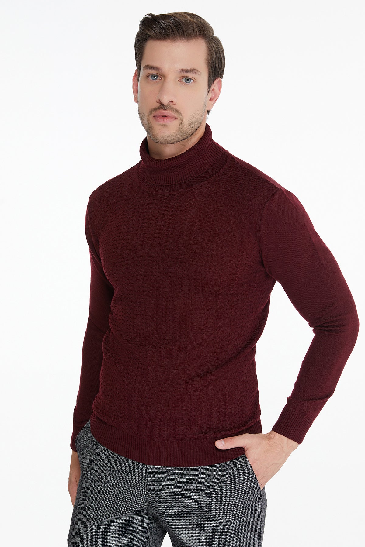 A rich burgundy turtleneck sweater with a ribbed neckline and cuffs, crafted from smooth knit fabric.