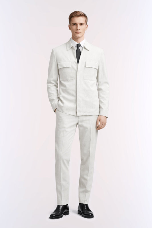 Model wearing a regular fit light gray pinstripe linen-blend casual suit with chest pockets and matching trousers