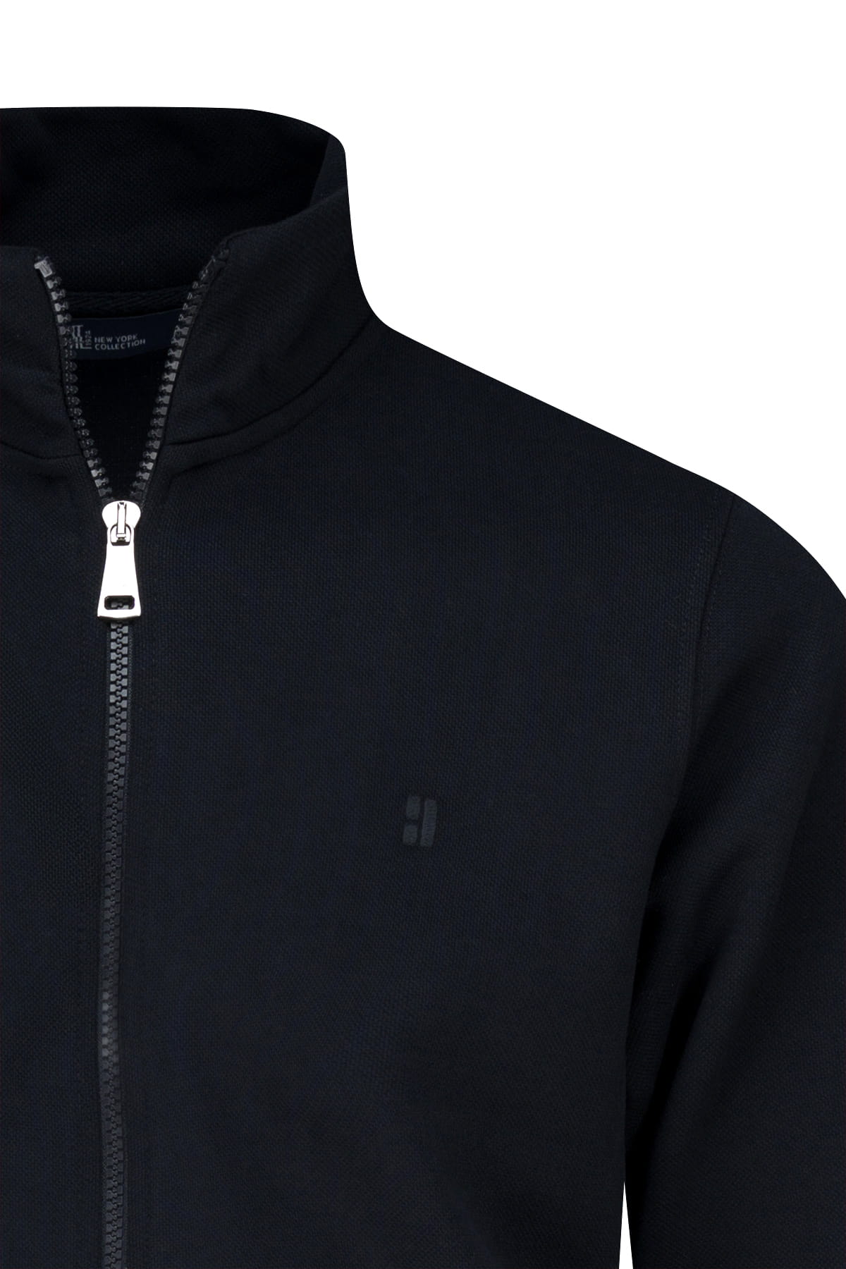 Black regular fit zip-up jacket with silver zipper and subtle chest logo complementing a regular fit navy mock neck cardigan
