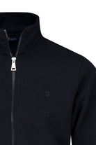 Black regular fit zip-up jacket with silver zipper and subtle chest logo complementing a regular fit navy mock neck cardigan