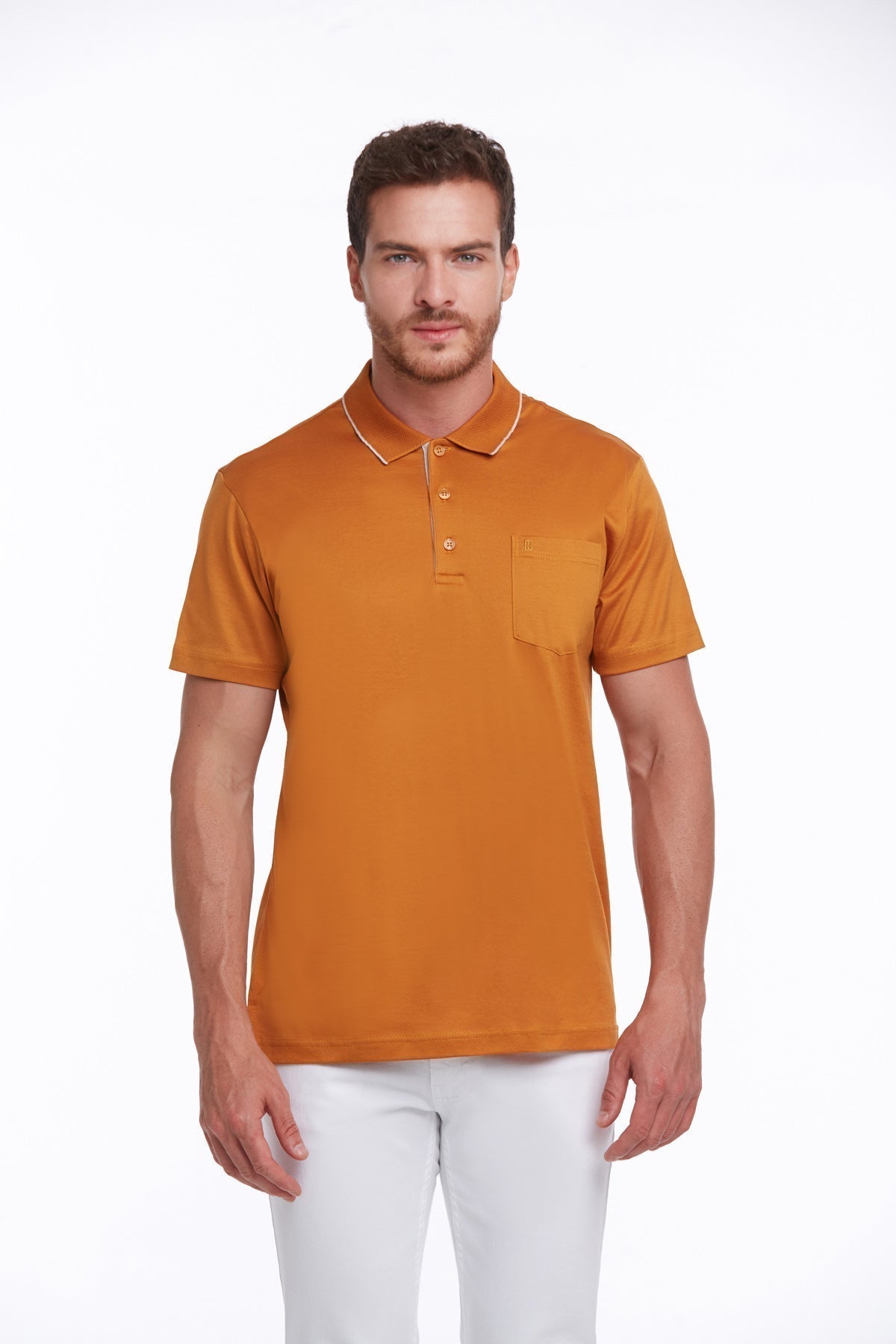 A man wearing a solid orange short-sleeved polo shirt with a contrasting white collar and button placket, featuring a single chest pocket.