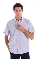 Light blue short-sleeved button-down shirt with a subtle textured weave.