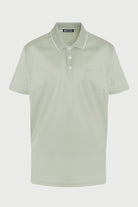 A light green short-sleeved polo shirt with a white trim collar and button placket.