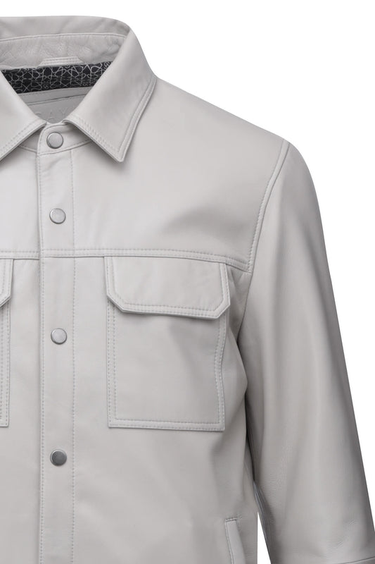 Light gray leather button-up shirt with two front pockets and a subtle patterned inner collar lining.